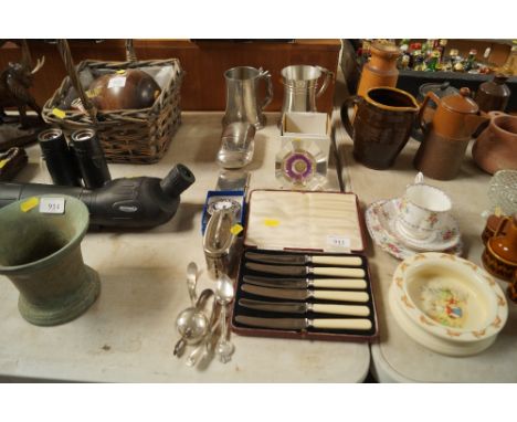 A collection of metal ware to include hip flask, tankards, butter knives and various other cutlery, a Barclays Bank home safe