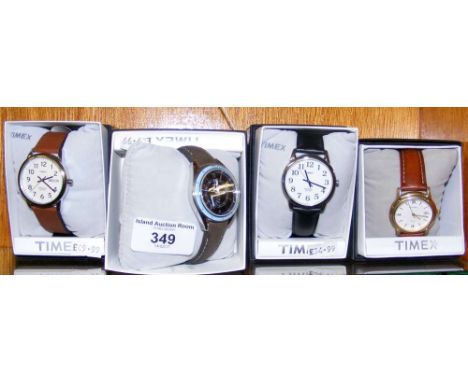 Four Timex gents wrist watches (new in original boxes)