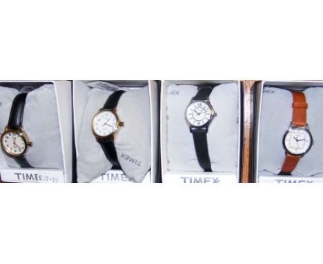 Four Timex ladies wrist watches (new in original boxes)