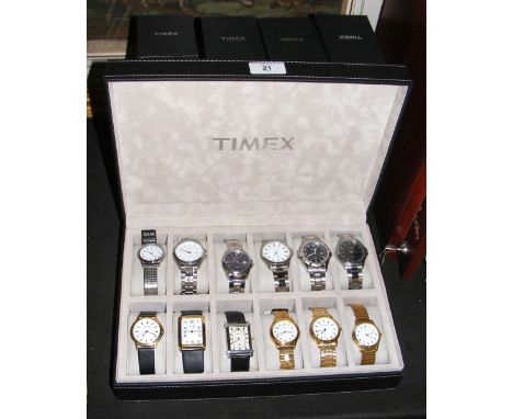 Twelve new Sekonda gent's wrist-watches in presentation case, together with spare Timex boxes
