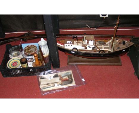 A model trawler, together with vintage postcards, collectable ceramic ware