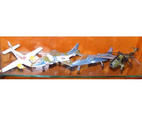 Four Dinky Toys die-cast model aircraft, including No.722 Hawker Harrier Jump Jet, No.618 Military Sea King Helicopter, etc.