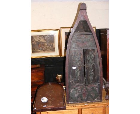 Vintage Corinthian bagatelle board, together with a carved boat shaped storage unit