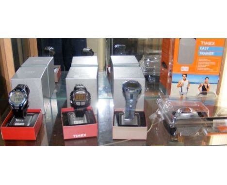 Three Timex gents digital wrist watches and one other (new in original boxes)