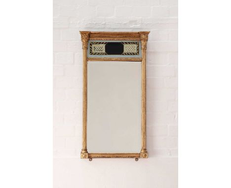 A George III giltwood and gesso pier mirror,the moulded cornice over a verre églomisé panel and a chamfered plate, within flu