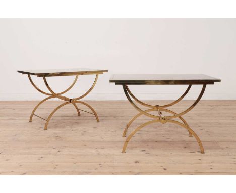 A pair of brass low side tables,c.1970, French, each with a brushed rectangular top over an 'X' framed base united by stretch