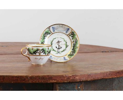 An important Paris porcelain cup and saucer from Nelson's 'Baltic Service',c.1802, each decorated with a border of oak leaves