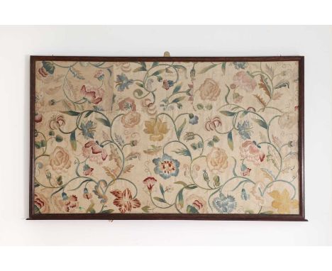 A silk embroidered panel,late 17th/early 18th century, with stylised foliate decoration in the style of crewel work,69 x 120c
