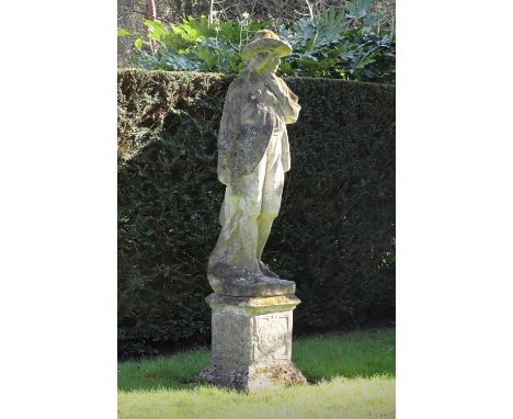 A weathered stone figure of a man,19th century, the pensive subject in period costume, with wide brim hat, on a plinth,40cm w