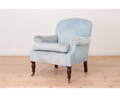 A 'Dahl' armchair,almost certainly by George Smith, late 20th century, upholstered in light blue fabric and raised on turned 