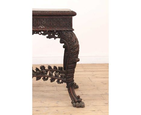 An Anglo-Indian padouk card table,mid-19th century, possibly Bombay, the fold-over top raised on cabriole legs, united by str