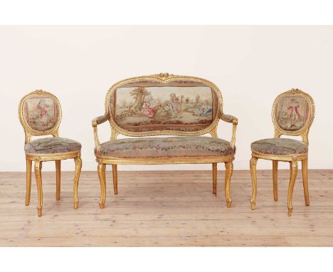 A gilt-framed canapé,c.1900, French, upholstered with tapestry panels,110cm wide50cm deep110cm high, andtwo chairs,41cm wide3