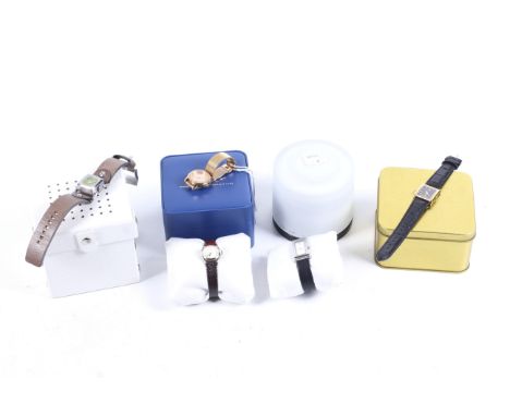 Five various lady's fashion watches. Comprising; Bering, a stainless steel rectangular wrist watch circa 2013, on a black lea