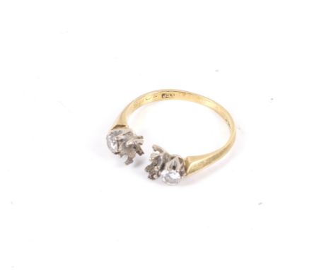 A vintage 18ct gold and diamond three stone ring mount. Broken through the middle setting so now only claw set with the two r