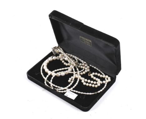 Three cultured-pearl jewels. Comprising a cultured-pearl single row necklace, on an oval clasp stamped '14K', 53cm long overa