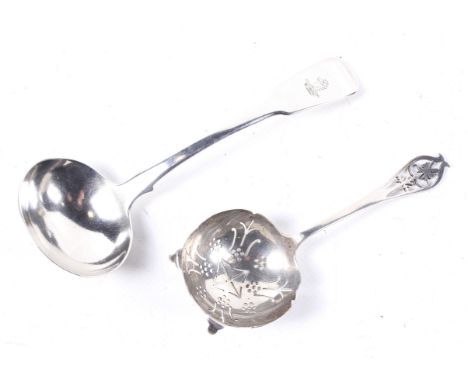 A William IV silver fiddle pattern sauce ladle and a later sifter spoon. The crested ladle with hallmarks for London 1834 (th