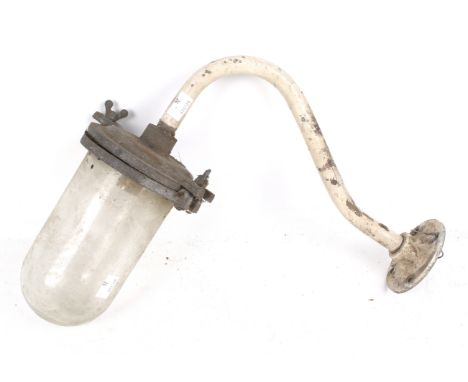 A vintage industrial outdoor light and wall bracket. H36cm 