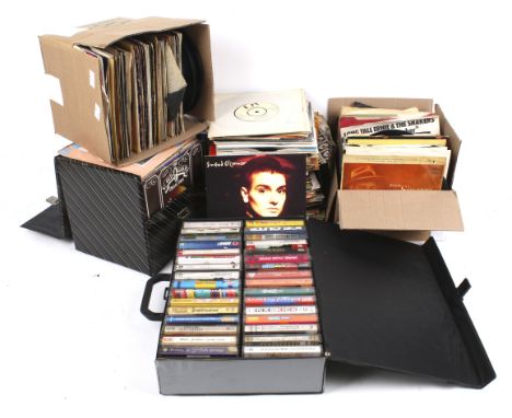 A collection of vintage 7" vinyl single records. Including Tommy Bruce, David Bowie, Mikey Dread, etc. the majority in the or