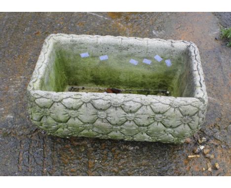 A reconstituted stone rectangular garden planter. L49cm x D28cm x H24cm