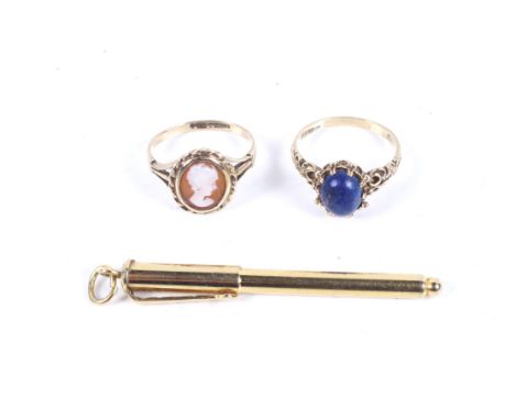 Two vintage 9ct gold and gem rings and a gold-plated pendant biro. The rings comprising an oval cabochon lapis lazuli single 