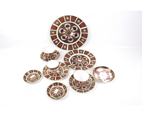A quantity of vintage Royal Crown Derby Old Imari pattern porcelain. Including two cups and saucers, plates 1128, etc. Max. H