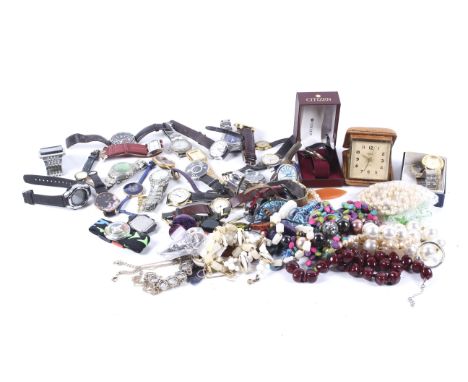 A collection of mostly 'designer' wrist and bracelet watches. A travel alarm clock and a small quantity of miscellaneous cost