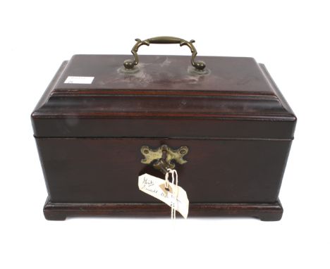 A Georgian mahogany tea caddy. With brass handle and escutcheon, key present. L26cm x D15cm x H15cm