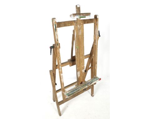 A Winsor & Newton full sized artist's oil acrylics folding wooden easel. Adjustable height