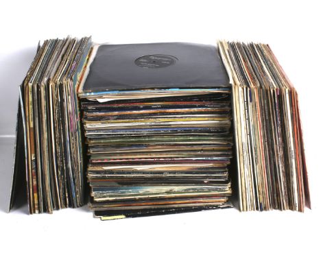 A collection of vintage LP vinyl records. Including The Beach Boys, T-Rex, Hot Chocolate, etc. the majority in the original s