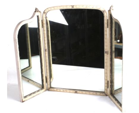 A vintage three section mirror. The frame painted cream with carved and moulded decoration, H65.5cm x W90cm x D3cm