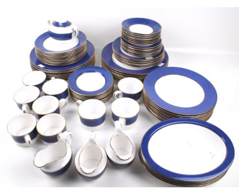 A Spode Sutton Blue bone china dinner/tea service. Including sixteen large dinner plates (27cm), nine tea cups, three jugs an