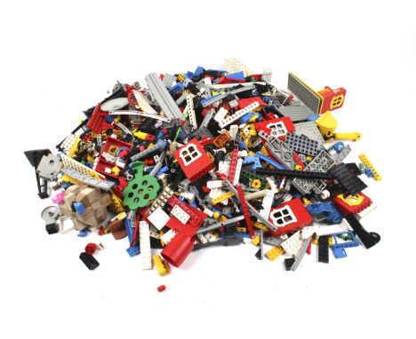 A collection of vintage Lego parts and pieces. Including some mini figures, building blocks, etc. Condition Report: Over ten 