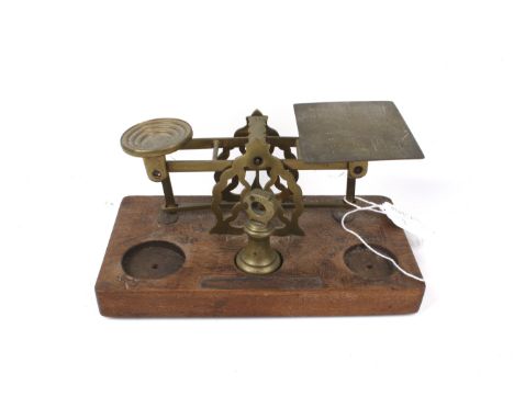 A set of vintage brass postage scales by S. Mordan & Co. Including a 4oz bell weight. L21cm x D11cm x H11cm