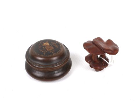 Two pieces of treen. Comprising a mushroom netsuke and a circular marquetry pill box. Max. H5cmBeing sold on behalf of Childr