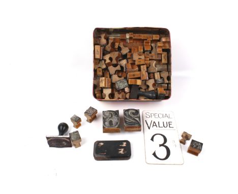 A collection of vintage rubber ink stamps. Including numbers, letters, etc. Various sizes. 