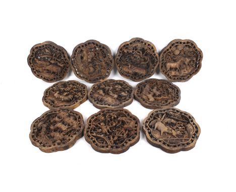 A set of ten traditional Chinese zodiac wood carved panels. Of circular form, relief carved and pierced, (no bull or dragon).