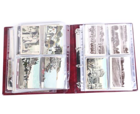 A ring binder album of assorted vintage postcards. All held in clear plastic sleeves, Circa 1910 - 1920 including Christmas, 