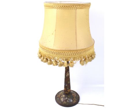 A vintage table lamp. The stand decorated with polychrome pokerwork, on a circular base, H43cm (excluding fitting)