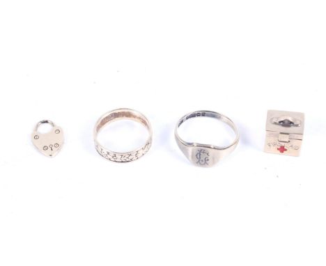 A small collection of jewellery including a 9ct gold oblong signet ring with a monogram. On a tapering D-section shank with h