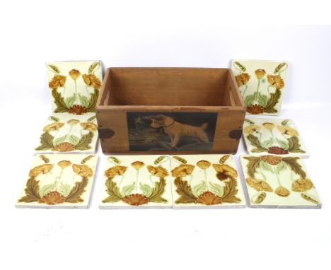Set of eight Art Nouveau ceramic wall fire side tiles. 'Poppy flower and leaf' decoration, 'M T W C, 3' verso, 15cm x 15cm