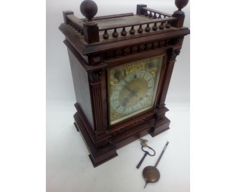 An Edwardian mahogany cased 8 day mantle clock with three train movement, approx height 43.5cm.