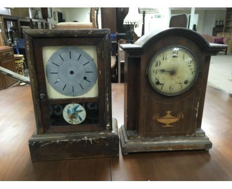 Two mantel clocks.