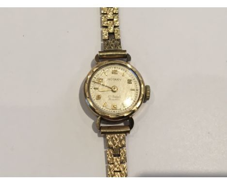 A Ladies 9ct Gold Rotary Watch with orgional 9ct Gold strap weight 14g.