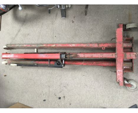 A portable crane engine hoist with assorted hooks, clamps etc (untested)