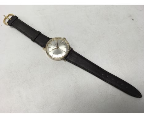 A gents automatic Eterna-Matic wristwatch with 9ct gold casing.