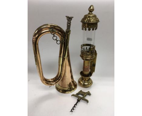A copper and brass bugle, vintage brass GWR railway lamp and a brass corkscrew (3).