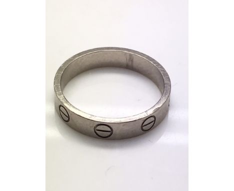 An 18ct Cartier white gold wedding band. Weight approx 3.33g, size approx K/L.
