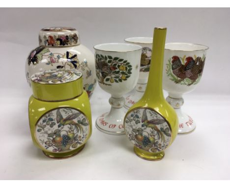 A Carltonware jar and cover with a conforming bud vase, three Royal Doulton Christmas goblets and a Masons ginger jar and cov