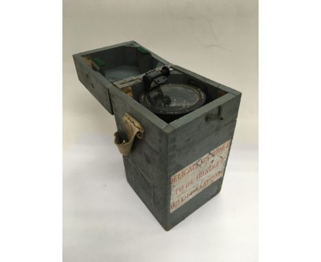 A cased type 06A military compass.