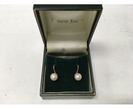 A pair of 9ct cultured pearl earrings.